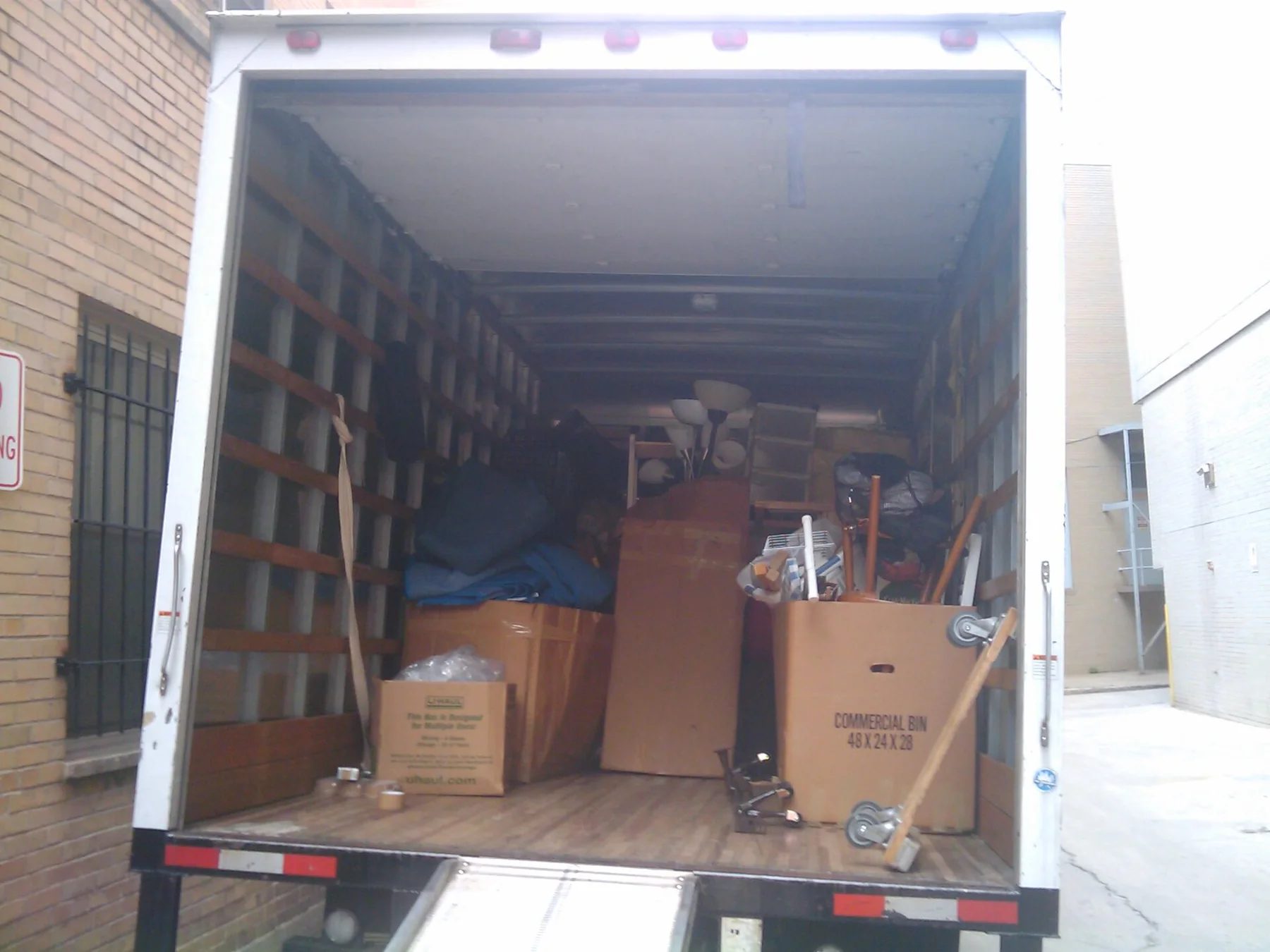 Cardboard boxes are stacked for a household move.